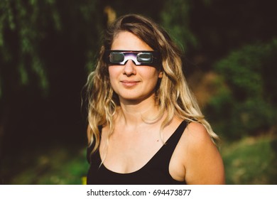 Woman Wearing Solar Eclipse Glasses