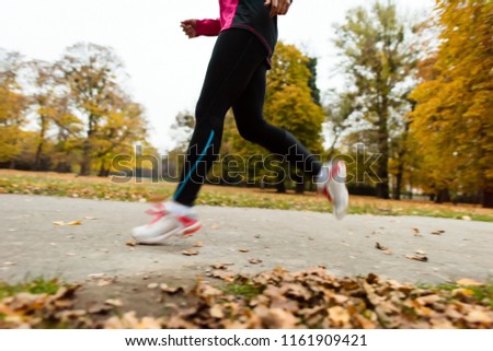 Similar – Blick auf den älteren Mann, der durch den Park joggt.