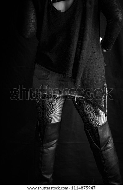 fishnets and thigh high boots