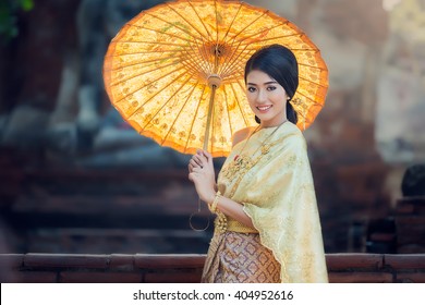 Woman wearing typical thai dress with thai identity culture of thailand