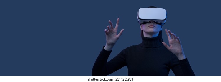 Woman wearing a VR headset and interacting with virtual reality interfaces - Shutterstock ID 2144211983