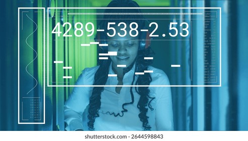 Woman wearing white shirt, headphones monitoring server racks with interface overlay at data center. Technology, cybersecurity, innovation, digital, professional, futuristic, data