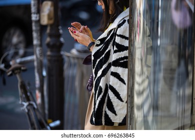 Woman Wearing Zebra Jacket With The Phone During Paris Fashion Week