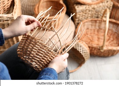 Woman weaving wicker basket indoors, closeup view - Shutterstock ID 1901378272