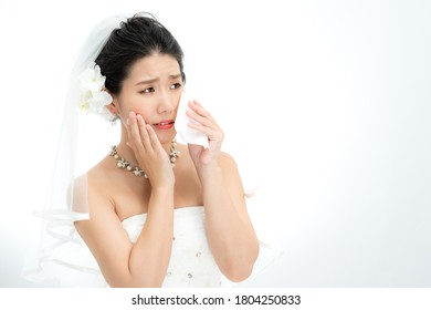 Woman In Wedding Dress Is Crying