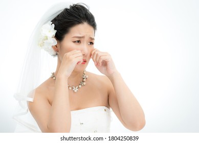 Woman In Wedding Dress Is Crying