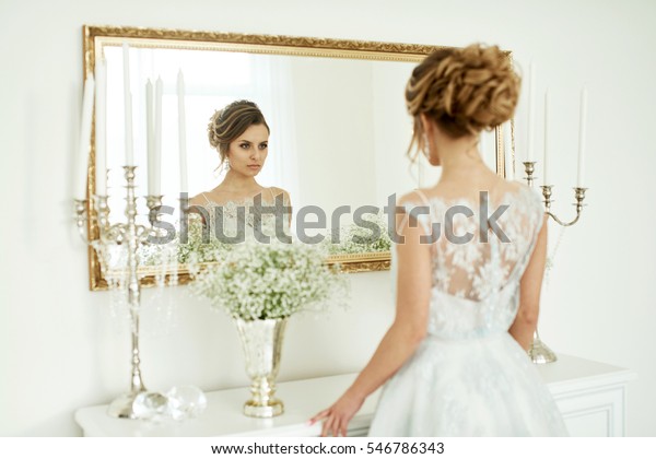 Woman Wedding Dress Standing Next Dresser Stock Photo Edit Now