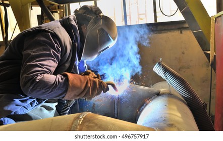 Woman Welder Welding With Mig-mag Method