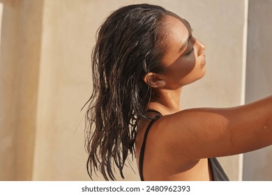 Woman With Wet Hair In Sunlight, Relaxed And Serene, Capturing Summer Vibes, Natural Beauty - Powered by Shutterstock