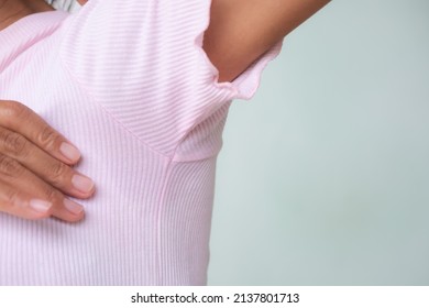 Woman Wet Shirt Underarm Close Up. Problem Armpit Sweat Stains And Strong Body Odor. Hyperhidrosis Sweating.hygiene For Good Health Concept.