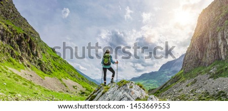 Woman while hiking in mountains