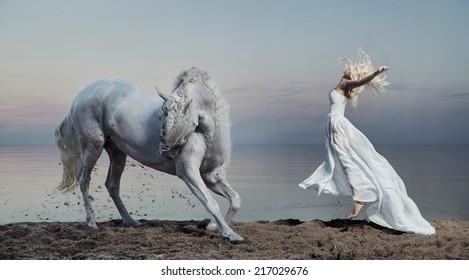 Woman with a white horse