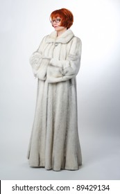 Woman In White Mink Long Fur Coat