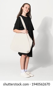 Woman With White Tote Bag