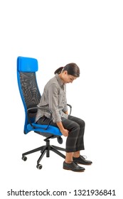 Woman Who Adjusts His Ergonomic Chair In The Office