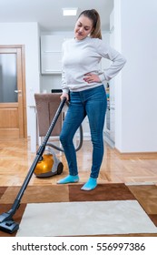 Woman who cleans the floor of the house