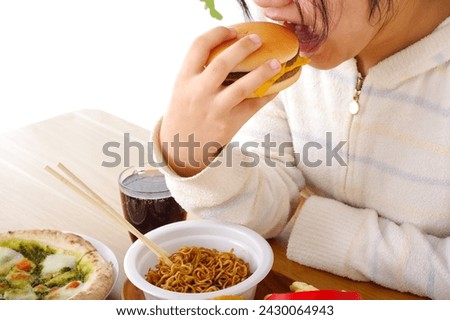 A woman who eats a lot of fast food