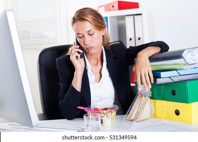 Woman Who Is Fed Up With It At The Office During Her Lunch Break