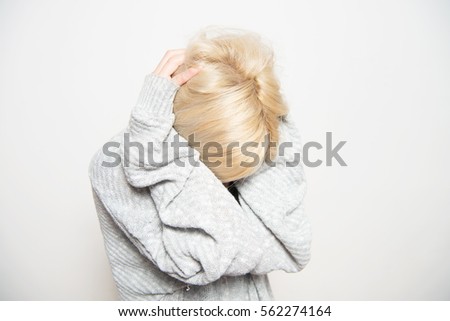 Similar – Young blonde woman with a headache