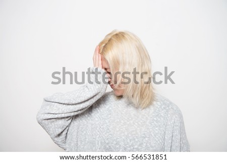 Similar – Young blonde woman with a headache