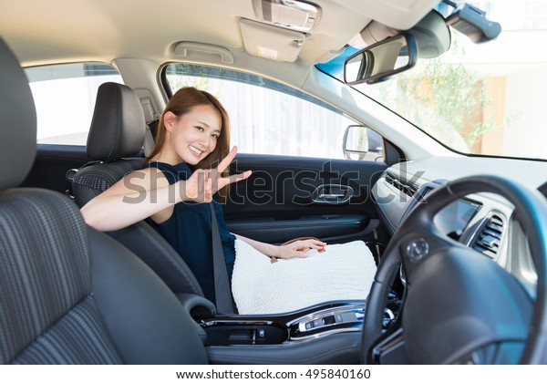 woman who\
sits down of the seat next to the\
driver