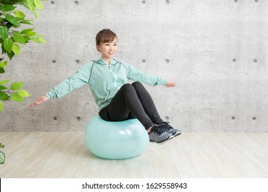 The Woman Who Trains With A Balance Ball