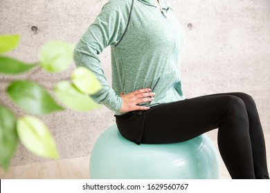 The Woman Who Trains With A Balance Ball