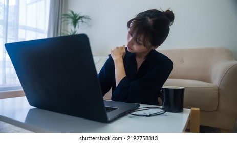 A Woman Who Is Unwell With Stiff Shoulders