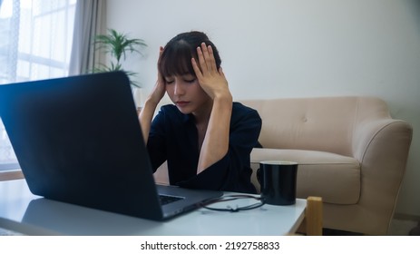 A Woman Who Is Unwell With Stiff Shoulders