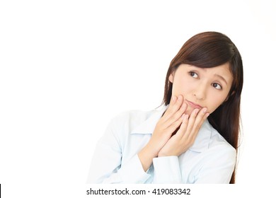 Woman who is worried - Shutterstock ID 419083342