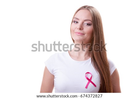 Woman wih pink cancer ribbon on chest. Healthcare, medicine and breast cancer awareness concept, isolated on white