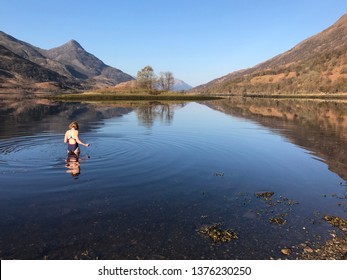 Woman Wild Swimming In A Scottish Loch