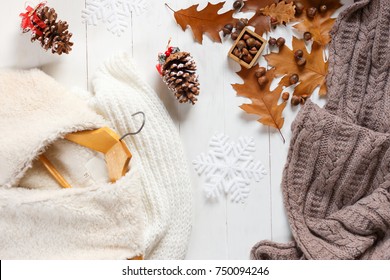 Woman winter clothes collage on white, flat lay, top view