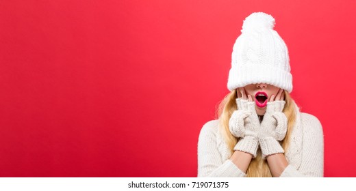 Woman With A Winter Knit Hat Pulled Over Her Eyes