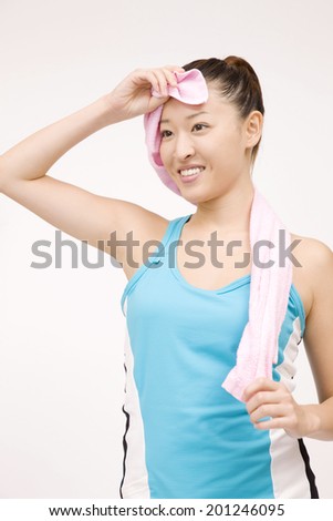 The woman wiping the sweat