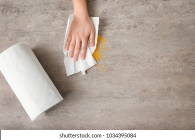 Woman Wiping Table With Paper Towel