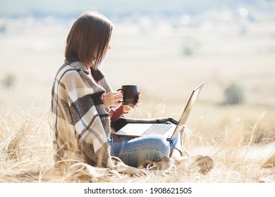 Woman Woking Outdoors. Remote Work On Camping. Female Typing On Pc.