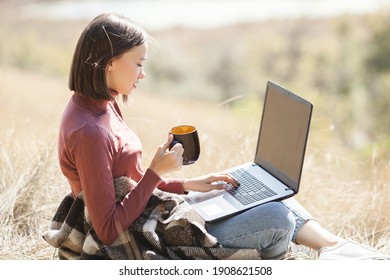 Woman Woking Outdoors. Remote Work On Camping. Female Typing On Pc.