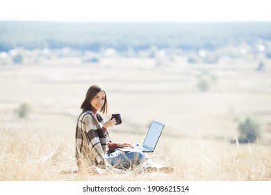 Woman Woking Outdoors. Remote Work On Camping. Female Typing On Pc.