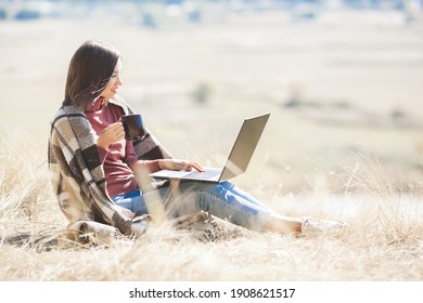 Woman Woking Outdoors. Remote Work On Camping. Female Typing On Pc.