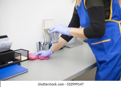 Woman At Work, Professional Maid Cleaning In Dental Office