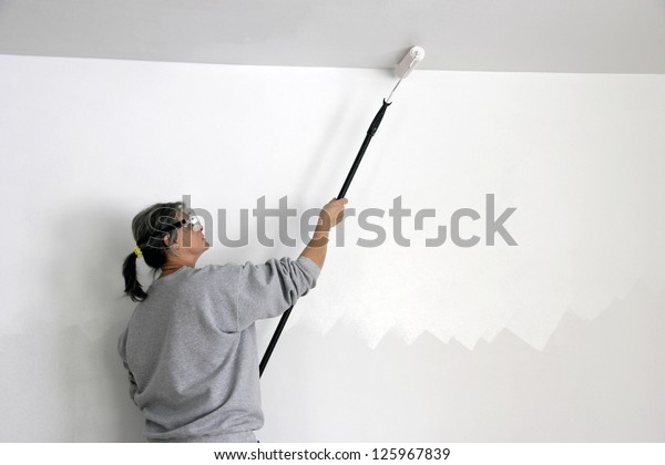 Woman Worker Painting Ceiling Roller Stock Photo Edit Now