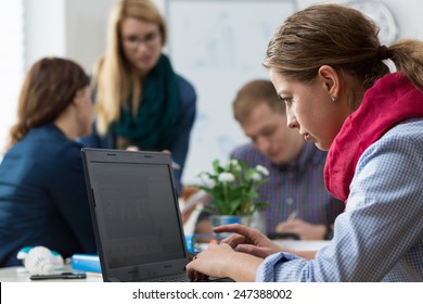 Woman Working Alone, Isolating From Business Team