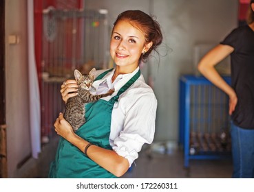 Woman Working In Animal Shelter