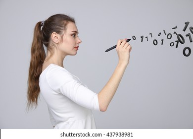 Woman working with binary code, concept of digital technology.