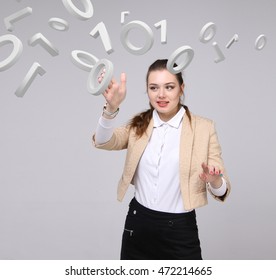 Woman working with binary code, concept of digital technology.