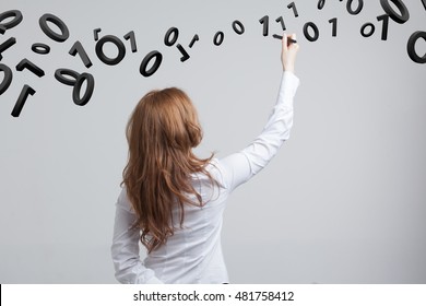 Woman working with binary code, concept of digital technology.