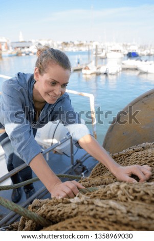 woman working in a boat