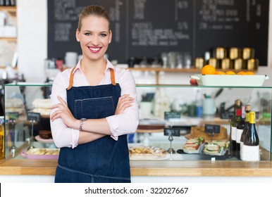 Woman working at cafe - Powered by Shutterstock