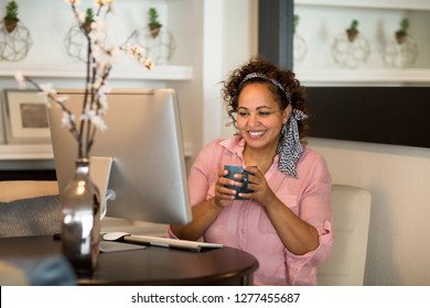 Woman Working From Her Home Office.